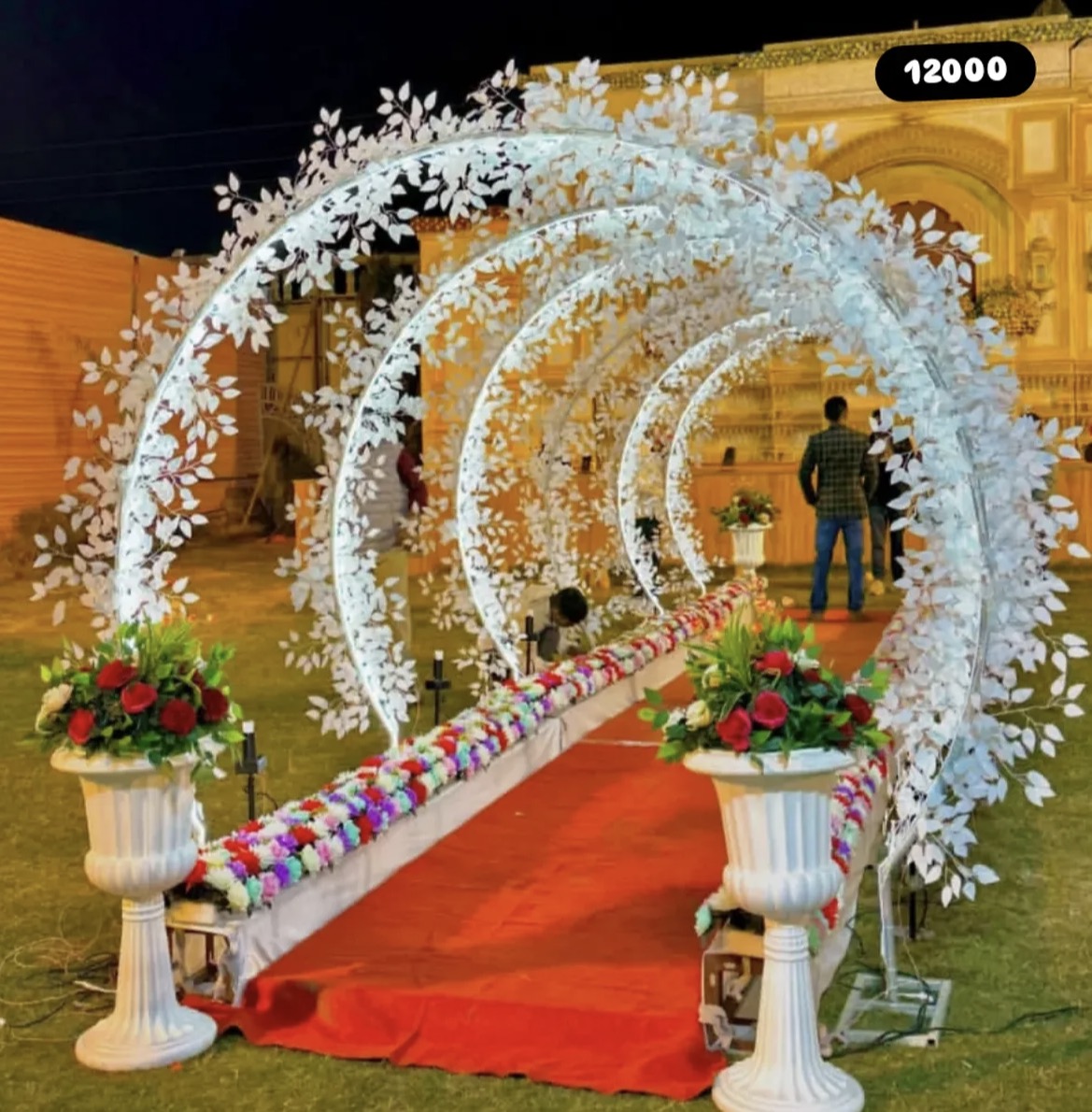 Mahakal illuminated floral tunnel for a wedding entrance